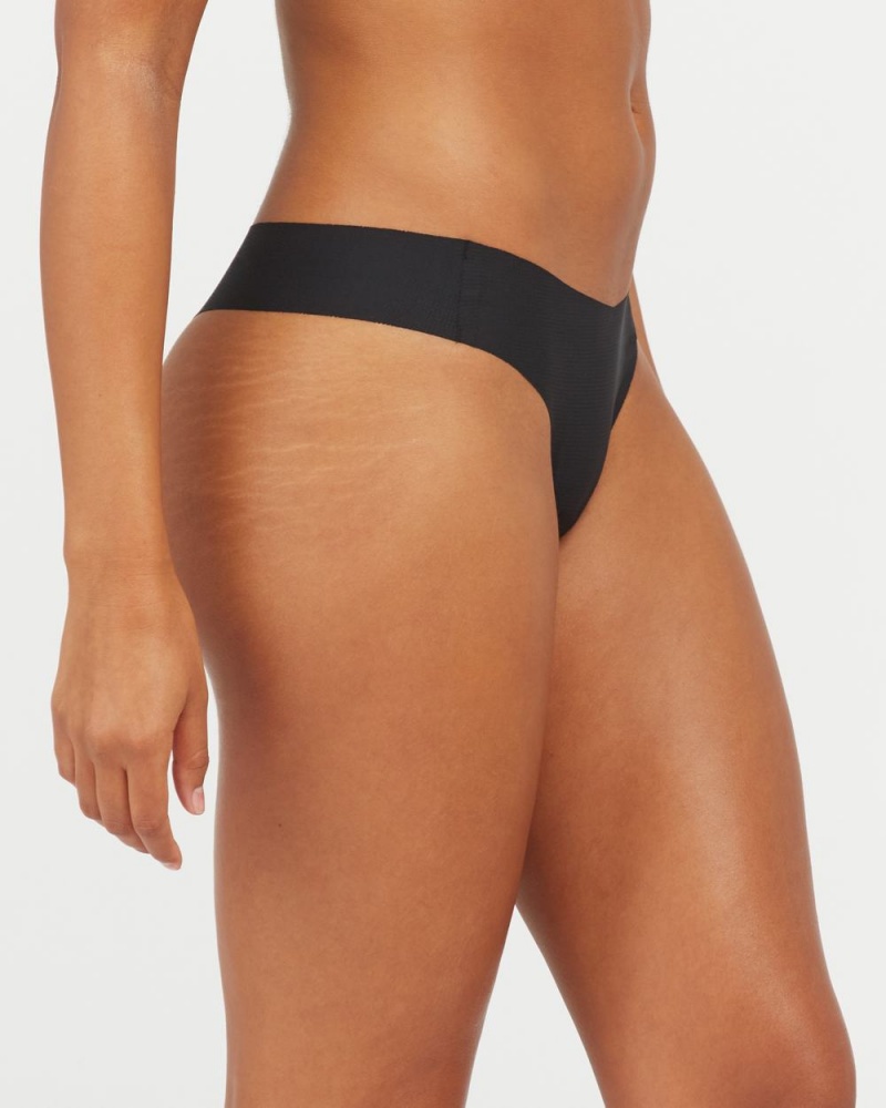 Tanga Spanx Under Statements® Černé | 4581903-VK